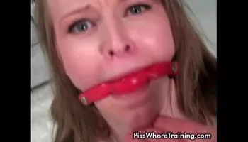 Blonde babe gets spanked and pisses herself